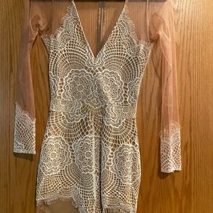 For love and lemons white lace with nude mesh. Great condition-worn once.